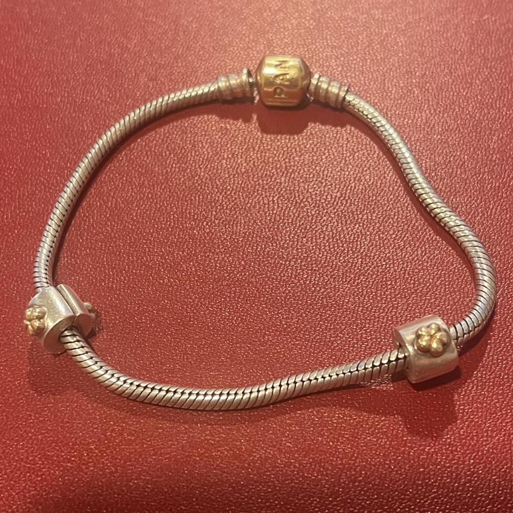 Pandora SS Bracelet with 14K gold clasp and two SS and 14K flower clips